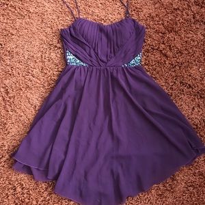 Two dresses. Both size 7, $10 each.